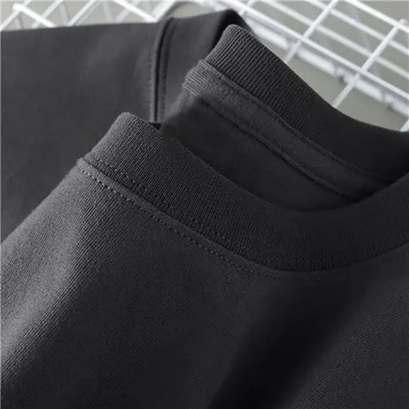 Close-up of the collar and sleeve details of the Certified Freak Cat Meme T Shirt Cotton Short Sleeve