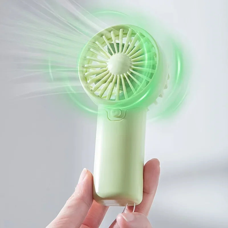 2025 lindo Mini ventilador portátil ventilador de mano ligero práctico tamaño de bolsillo bajo ruido pequeño ventilador eléctrico regalo para estudiantes ventilador al aire libre