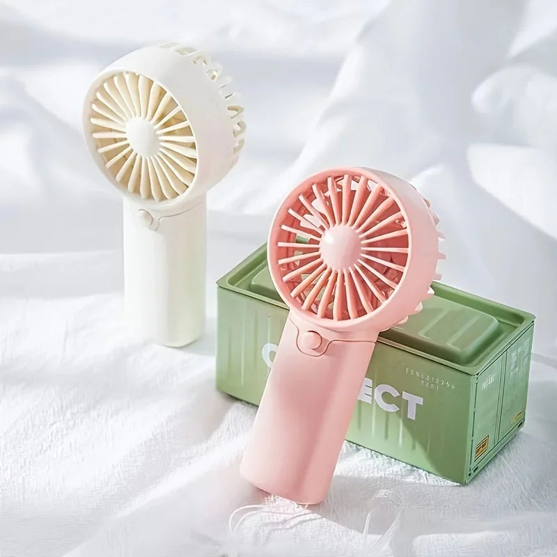 2025 lindo Mini ventilador portátil ventilador de mano ligero práctico tamaño de bolsillo bajo ruido pequeño ventilador eléctrico regalo para estudiantes ventilador al aire libre