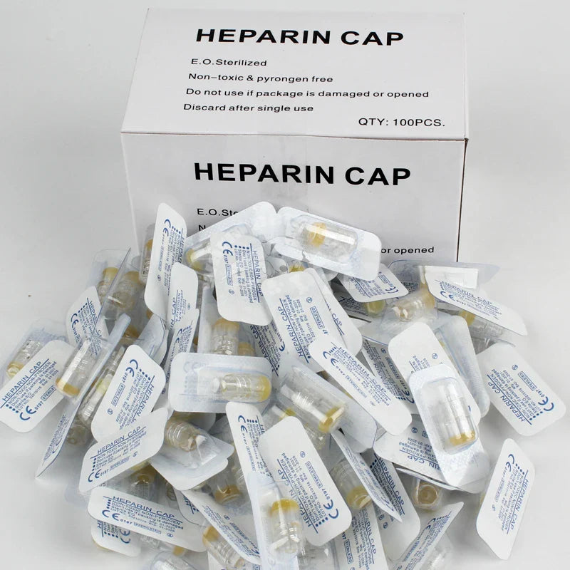 100 Uds. Gorro Heparin estéril para mascotas en caja, ideal para veterinarias y cuidado de perros y gatos.