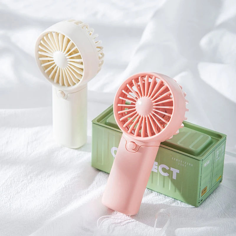 2025 lindo Mini ventilador portátil ventilador de mano ligero práctico tamaño de bolsillo bajo ruido pequeño ventilador eléctrico regalo para estudiantes ventilador al aire libre