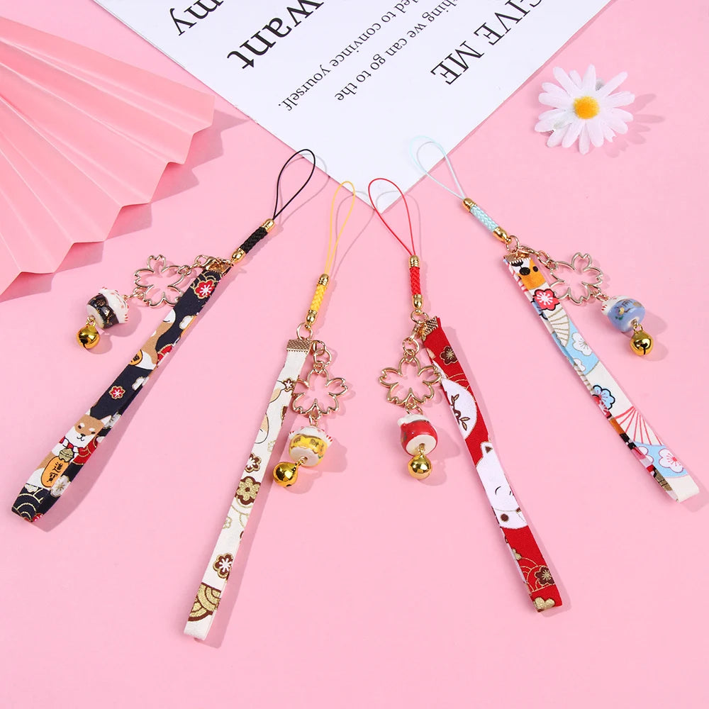 Cordón de correa para teléfono, cuerda colgante de muñeca, estilo japonés, antipérdida, Sakura, gato de la suerte, 1 unidad