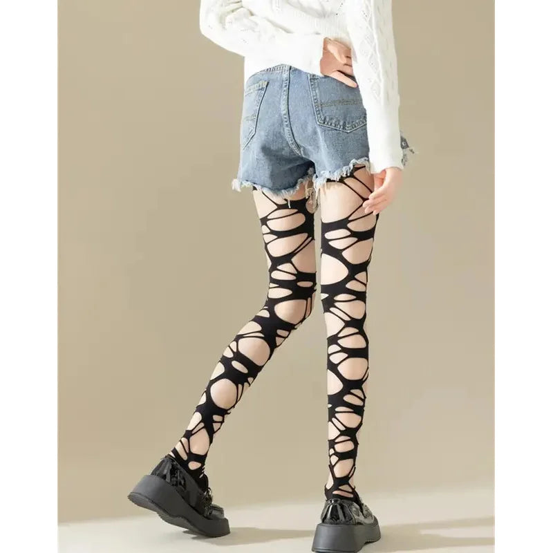 Medias de red rasgadas negras sexis para mujer, pantimedias de malla ajustadas con agujeros Punk gótico, mallas, estilo Emo, ropa de calle Egirl